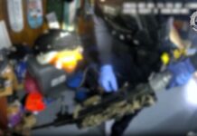 Exclusion zone established after weapons, explosives and drugs uncovered, Calliope